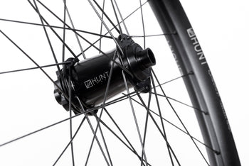 <html><h1>Front Hub</h1><i>We have gone all out on the front hub and beefed it up over standard Enduro wheelsets. These hubs have been selected based on their ability to perform on the most aggressive trails with oversized 17mm 7075-T6 axles for increased stiffness and Heatsinks built into the 6-bolt rotor mount helps to dissipate heat away from the hub and brake system.</i></html>