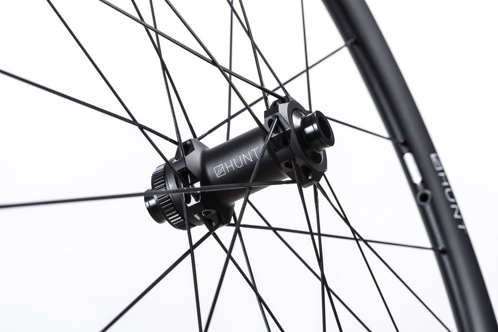 <h1>Hubs</h1><i>HUNT Sprint Disc straight-pull hubs, with extra bearing shielding for washing the bike. 5-degree/6-pawl RapidEngage freehub, with H_CERAMIK coating for enhanced durability. Easily removable end caps and freehub body for quick and easy maintenance.</i>