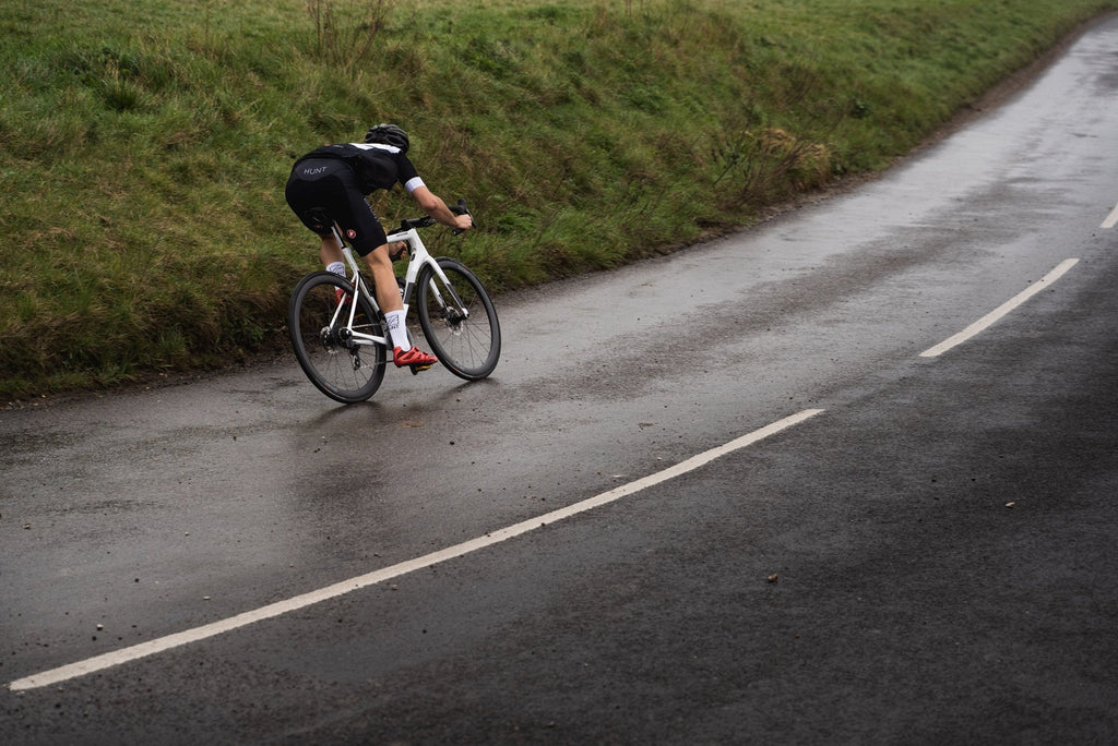 The Hunt 54 UD Carbon Spoke Disc wheelset being used whilst descending in the rain, showing the confidence in handling that the wheelset provides
