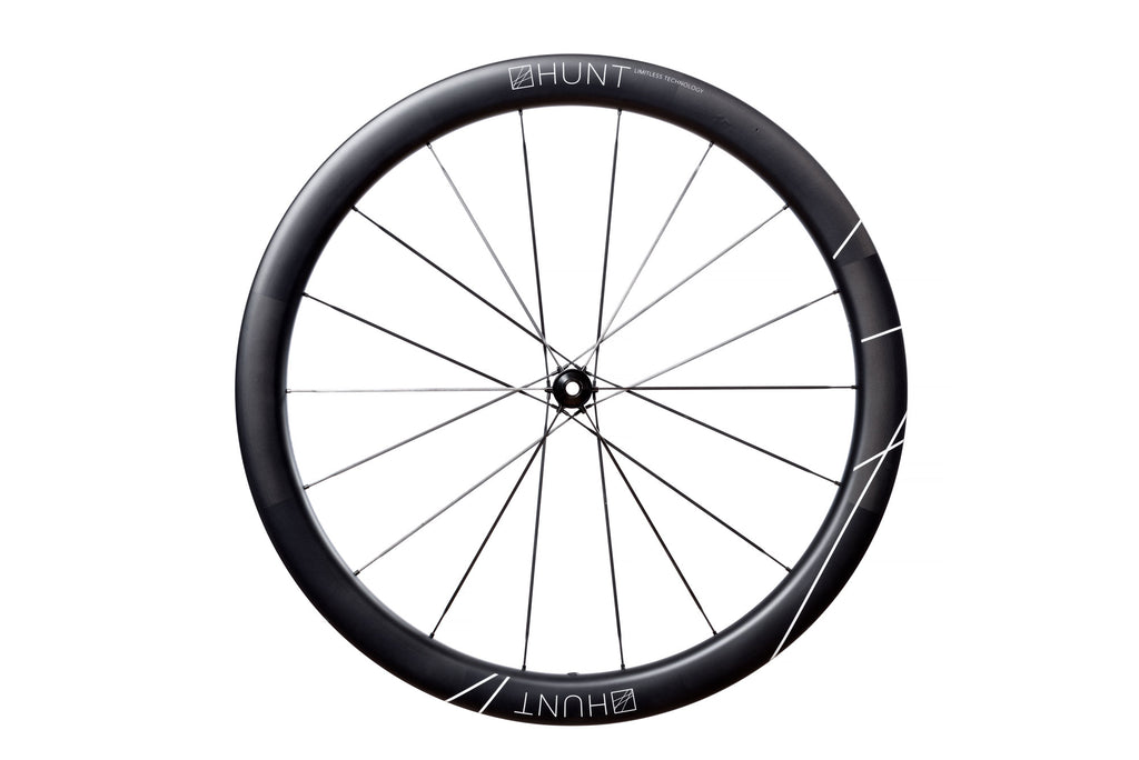The HUNT 48 Limitless UD Carbon Spoke Aero Disc Front Wheel, featuring the trademark white spoke decals on the rim.