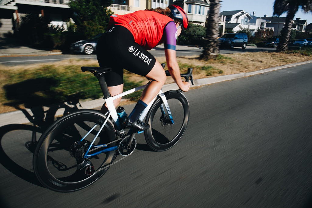 An LA Sweat team rider sprinting on the HUNT 65 Carbon Aero Disc Wheelset