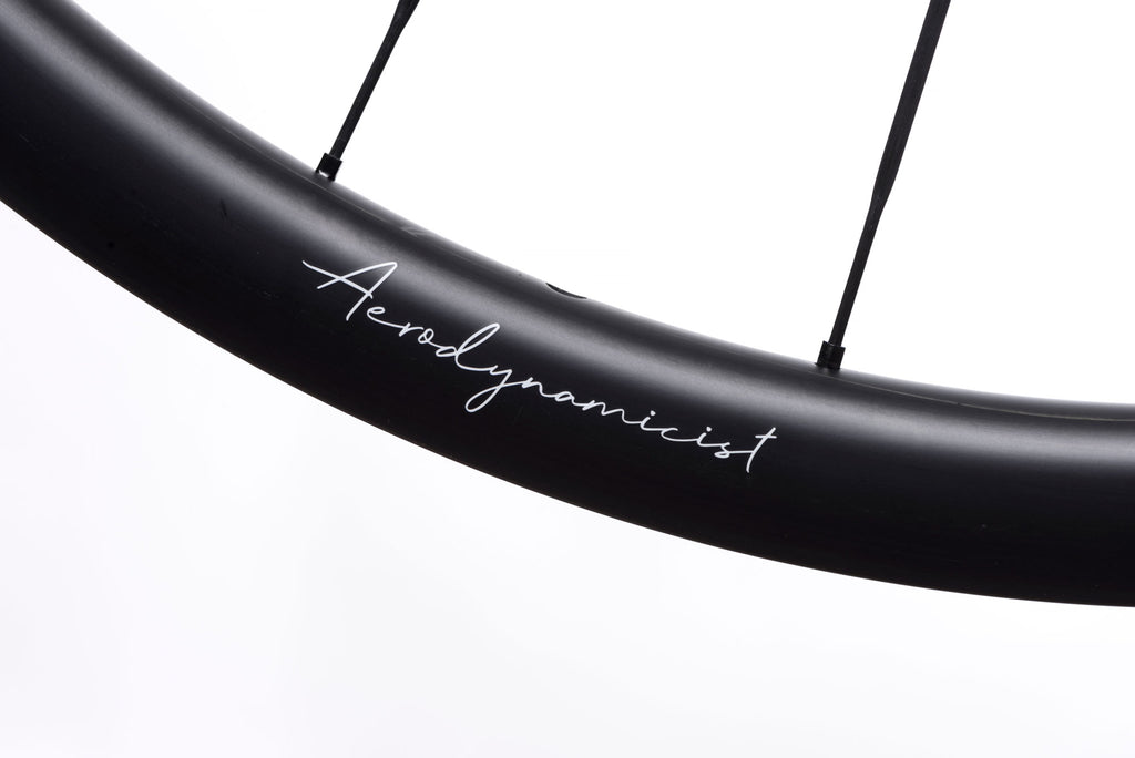Image showing the Aerodynamicist decal on the HUNT 32 Aerodynamicist UD Carbon Spoke Disc Wheelset, an example of the high attention to detail in the manufacturing process