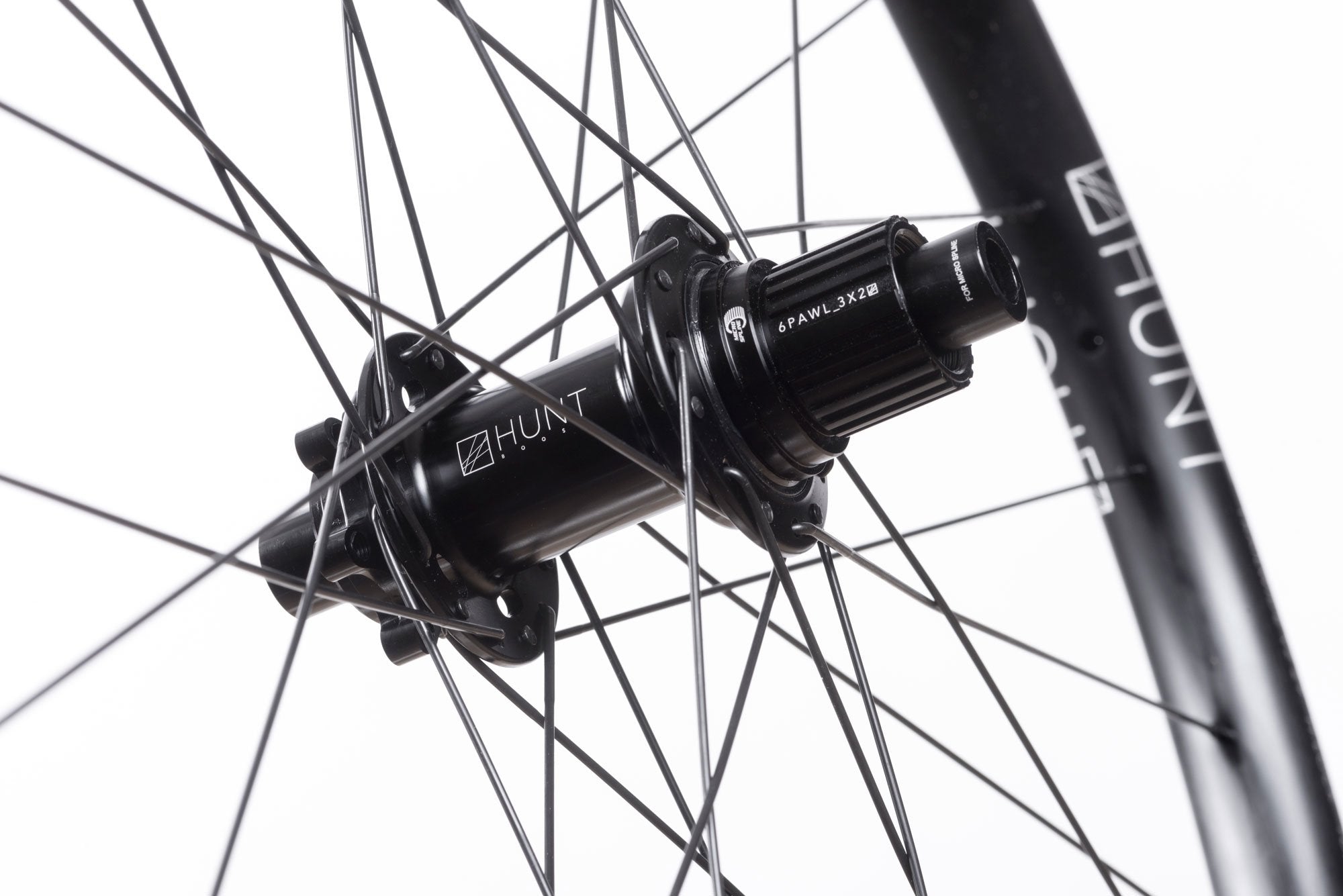 <h1>Rear Hub</h1><i>We create wheels to match the needs of riders who want the most from their wheels. The Trail Wide hubs have been chosen to increase stiffness, bearing durability and overall strength of your wheelset. On the rear, the RapidEngage MTB hubs with a fast 5 degree engagement, means you will be able to clear those janky tech climbs with ease.</i>
